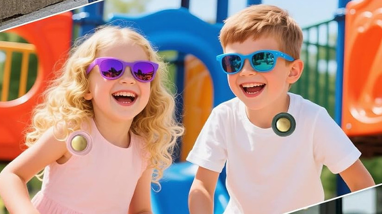 Two kids using the Ahuccf portable clip-on fan