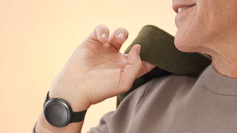 A person wearing the Ember Wave 2 on their wrist