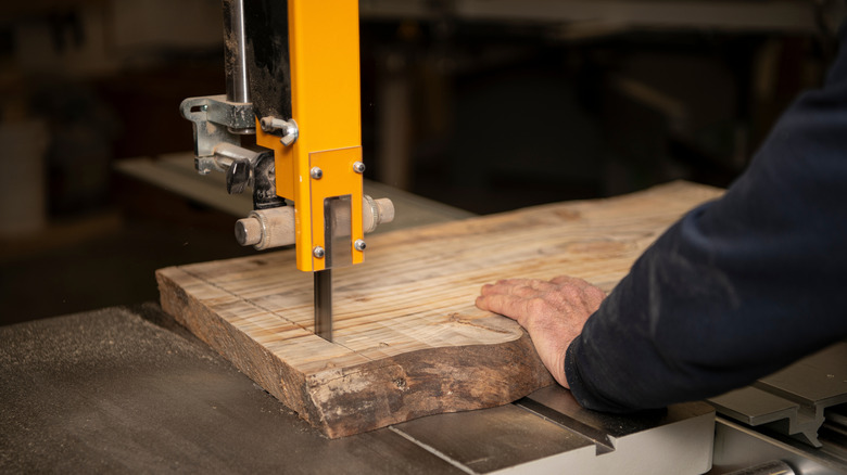 cutting rough lumber with a band saw