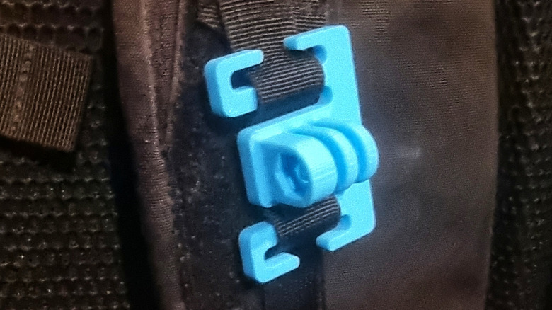 GoPro blue printed mount on backpack straps