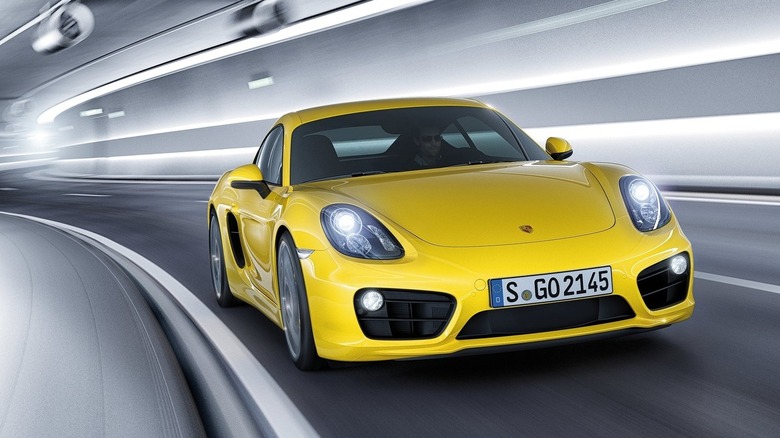 Porsche Cayman driving through a tunnel