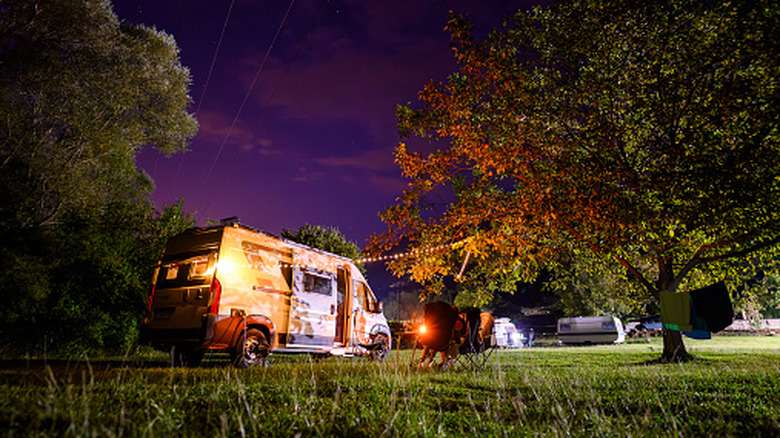 Camper van with string lights hung up outside