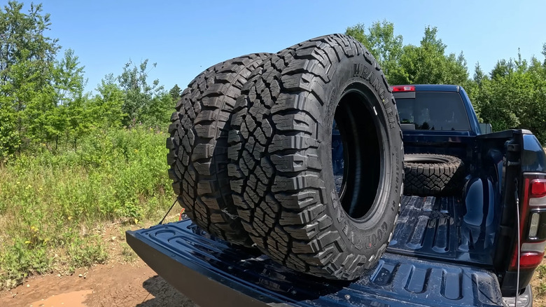A pair of Goodyear Wrangler DuraTrac RT on display