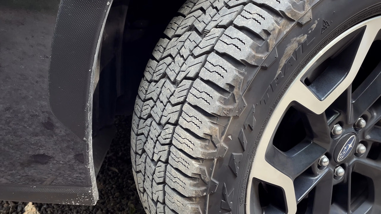 Close up of a Falken WildPeak A/T Trail tire on a Subaru