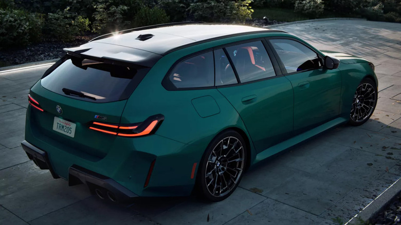A BMW M5 Touring on a road
