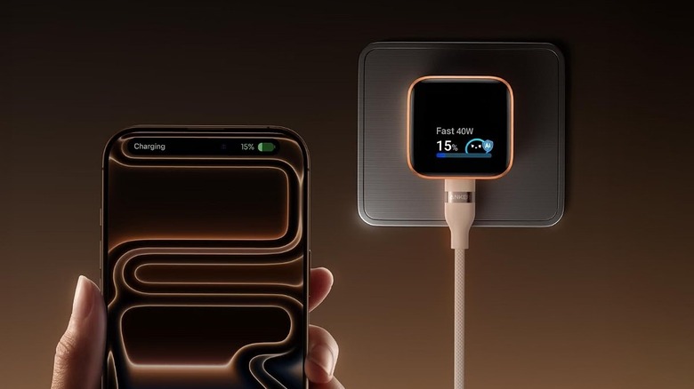 An iPhone charging via the Anker Nano smart display charger