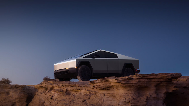 A Tesla Cybertruck on a desert plateau.