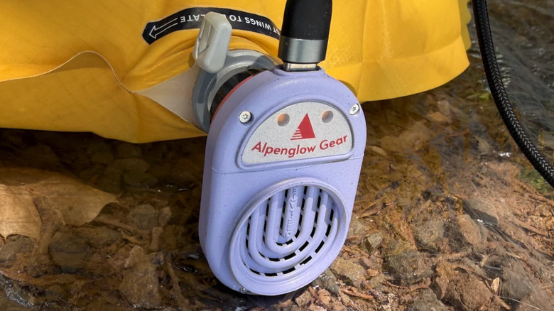The Alpenblow Lux inflating a sleeping pad.