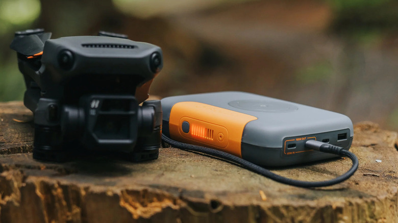 The BioLite Charge 100 Max charging a drone.