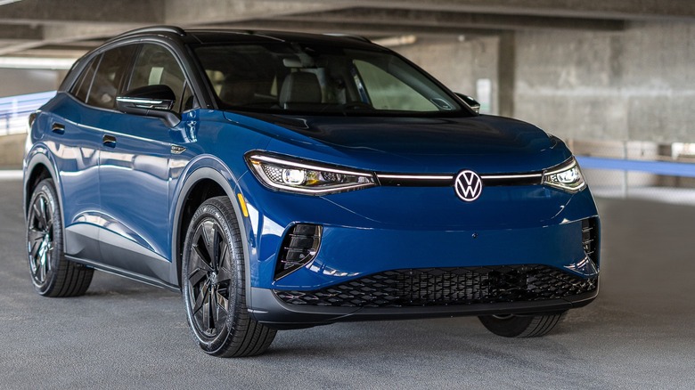 a dark blue VW ID.4 in a parking building