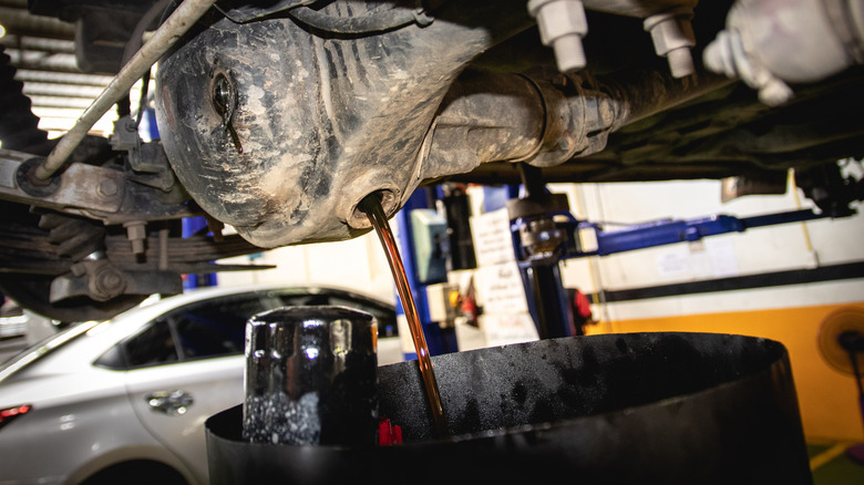 A vehicle getting its differential fluid changed
