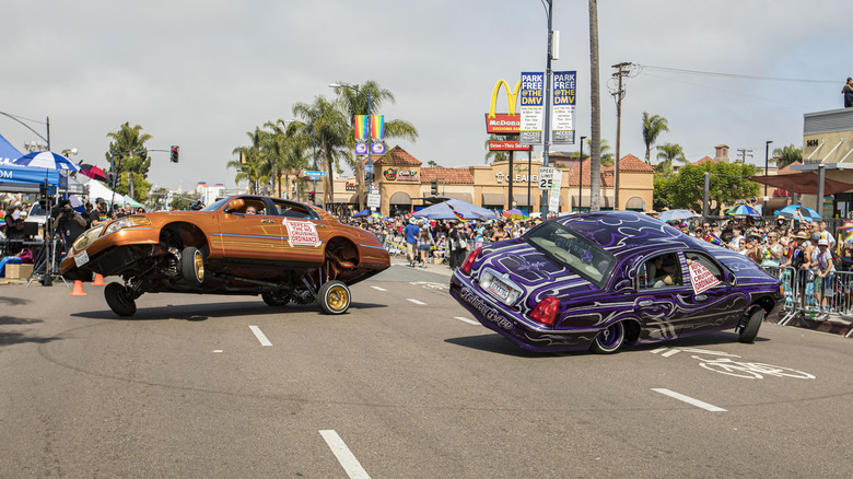 Lincoln Town Car lowriders in the street