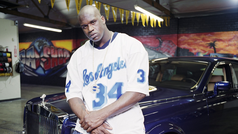 Shaq next to his custom Rolls-Royce Phantom