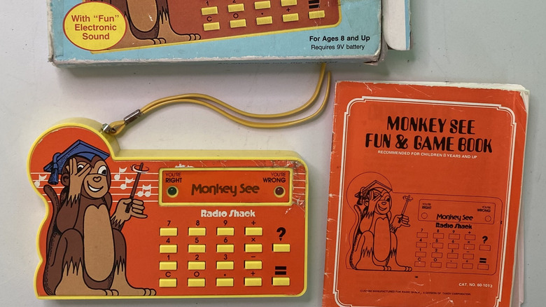 The box for the 1982 version of the Monkey See educational calculator