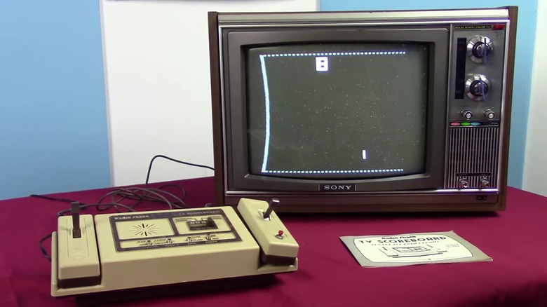 The Radio Shack TV Scoreboard - Model 60-3056 and a Sony TV showing a game