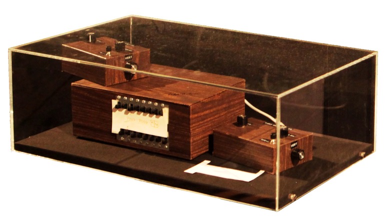 The Baer Brown Box on display under a glass case