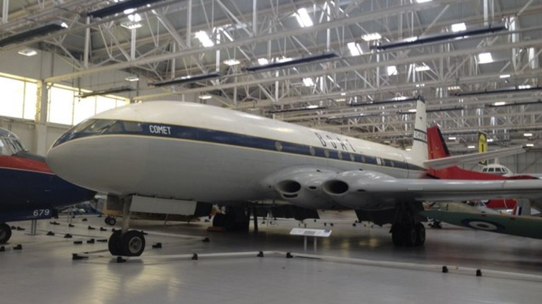 The world's first passenger jet, the de Havilland Comet, in a hangar on display