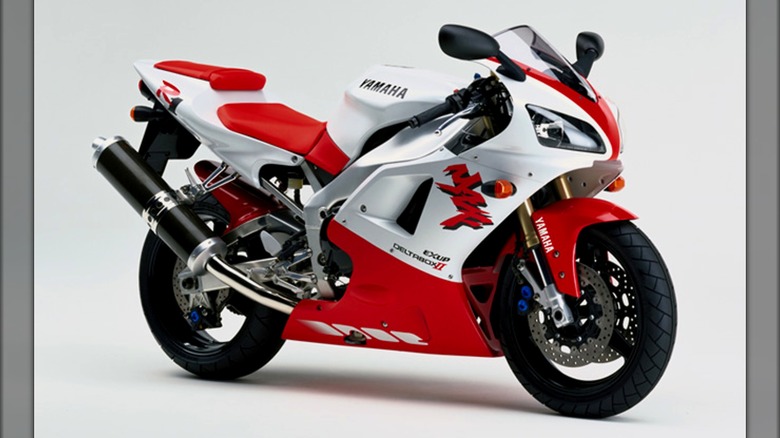 An image of a red and white YZF-R1 in a plain background