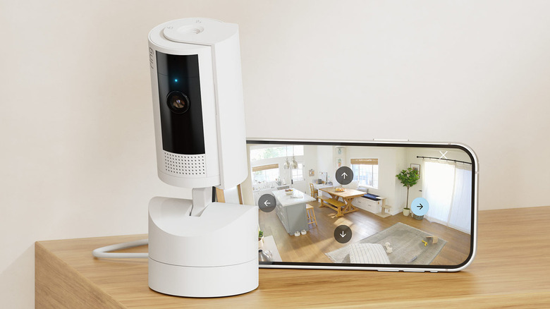 A shot of the Ring Pan-Tilt Indoor Camera and app