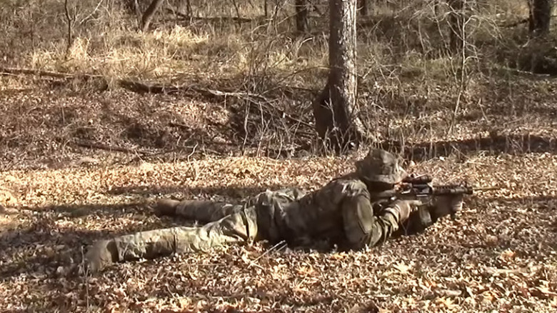 Military man lying prone