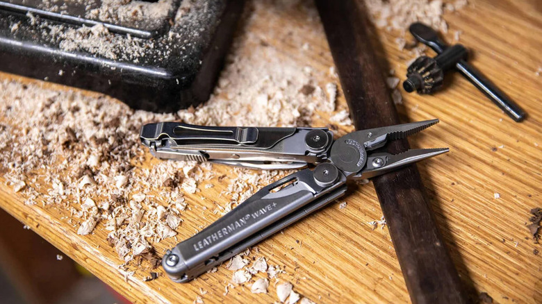A Leatherman Wave multitool on a work bench