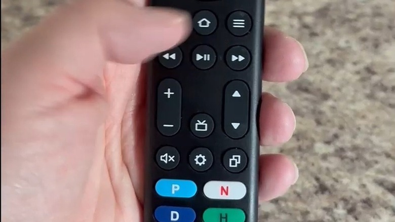 Person using replacement remote