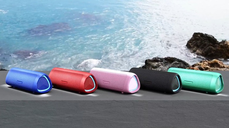 BolaButty speakers with shore in background