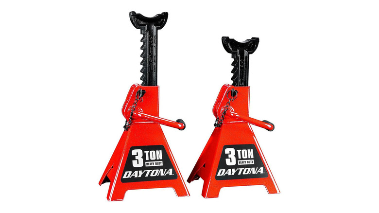 A pair of red Daytone-brand jack stands that boast 3-ton support.