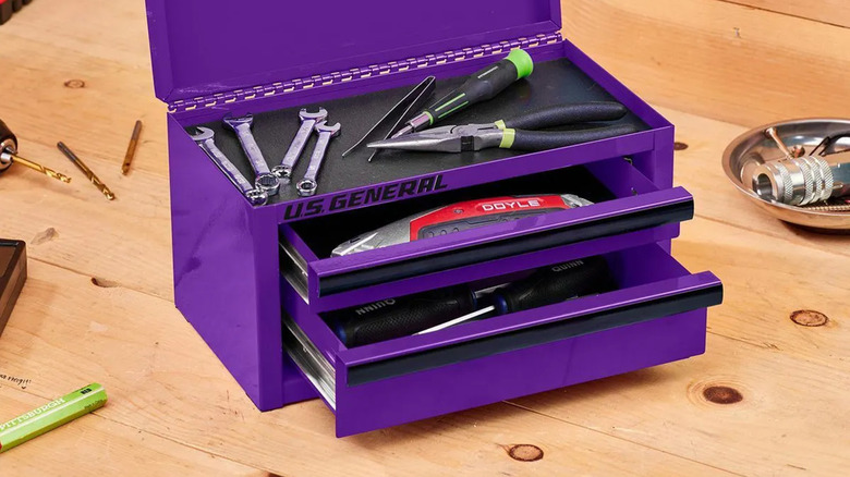 A small, purple toolbox made by U.S. General.