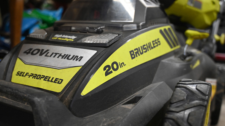 A Ryobi 20-inch lawnmower.