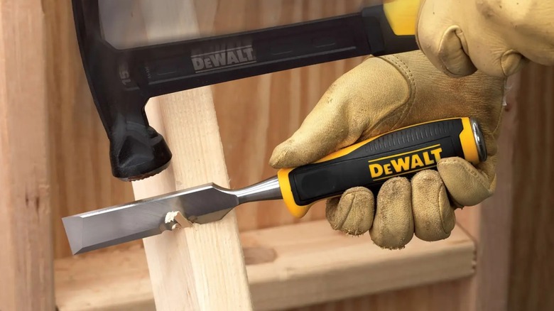 cutting into board with side strike chisel