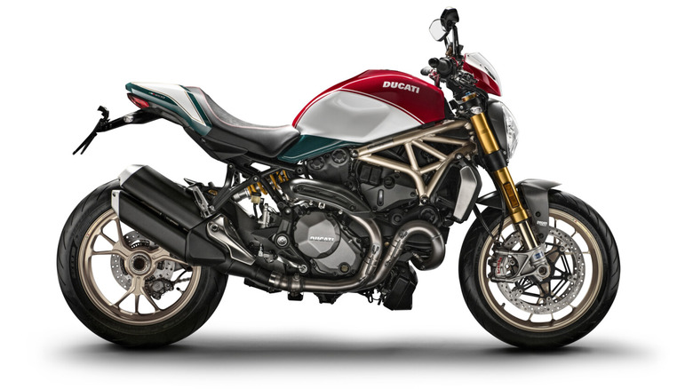 A Ducati Monster 1200 25 anniversary bike on a white background.