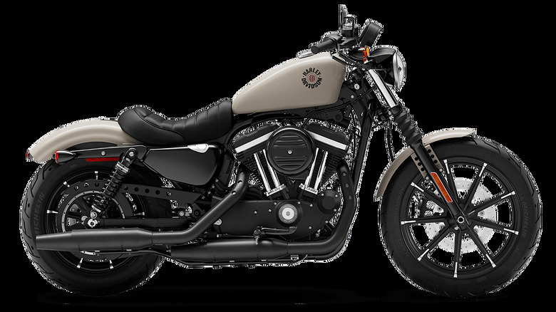 A Harley-Davidson Iron 883 from the side on a gray background.