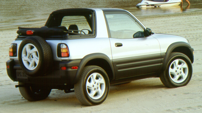 1996 Toyota RAV4 Convertible parked on a beach
