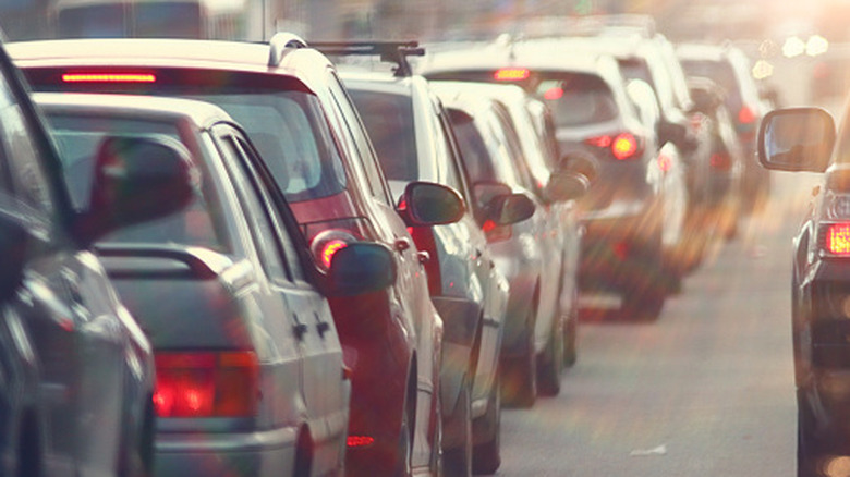 View of cars lined up in traffic