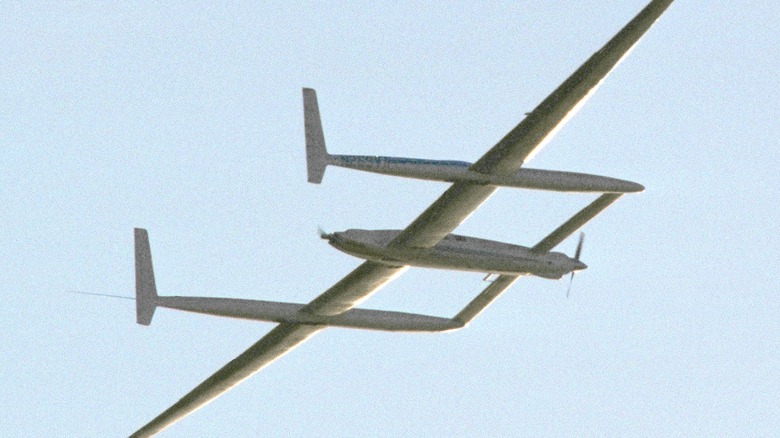 The Rutan Model 76 Voyager flying over blue skies