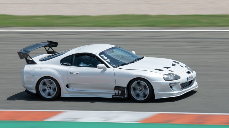 A Supra MK4 driving at speed