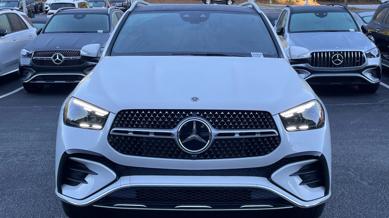 A white 2026 Mercedes-Benz GLE 580 in a Mercedes dealership