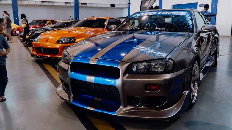 Popular Fast & Furious cars on display. 