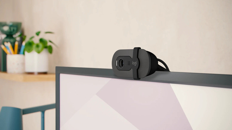 A Logitech Brio 101 mounted on top of a laptop screen