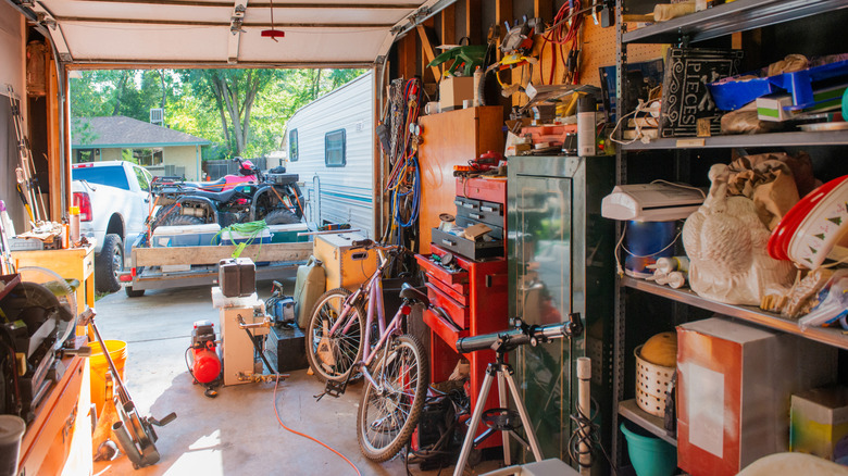 A garage packed with gadgets, tools, and other items