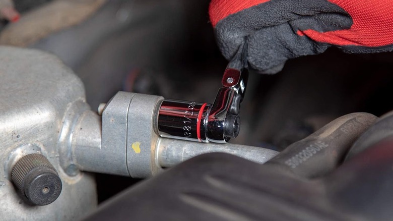 Person using SUNEX wrench
