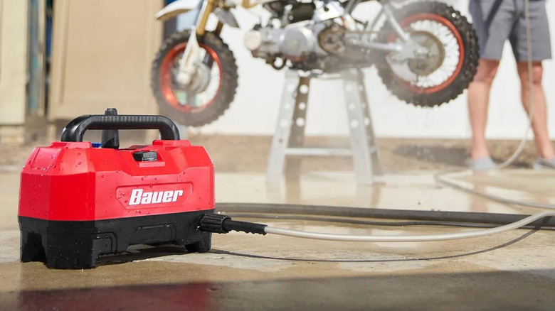 Washing a motorcycle with the Bauer portable pressure washer.