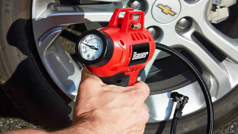 Inflating a tire with the Bauer inflator.