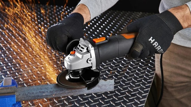 preparing metal stock with Warrior angle grinder
