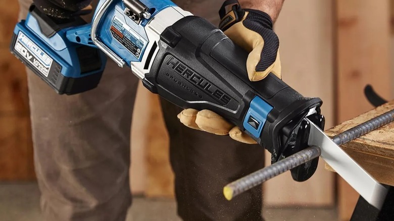 Cutting a piece of rebar with a Hercules reciprocating saw.