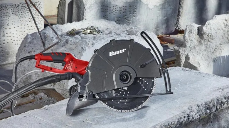 A Bauer saw on a worksite, set on a slab of concrete