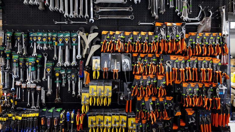 Dozens of hand tools on display inside a hardware store
