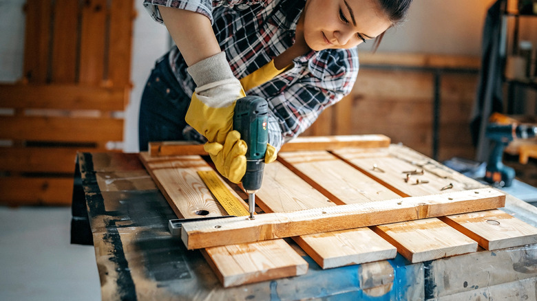 DIY enthusiast making table