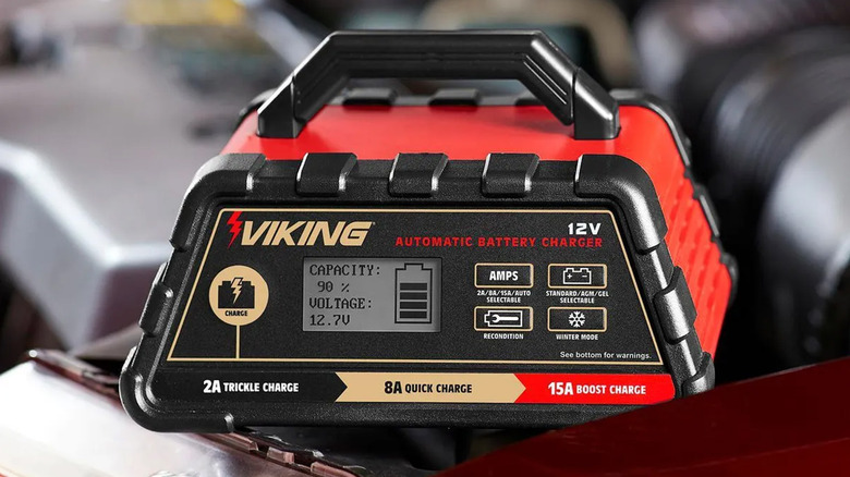 A Viking battery charger on a work surface